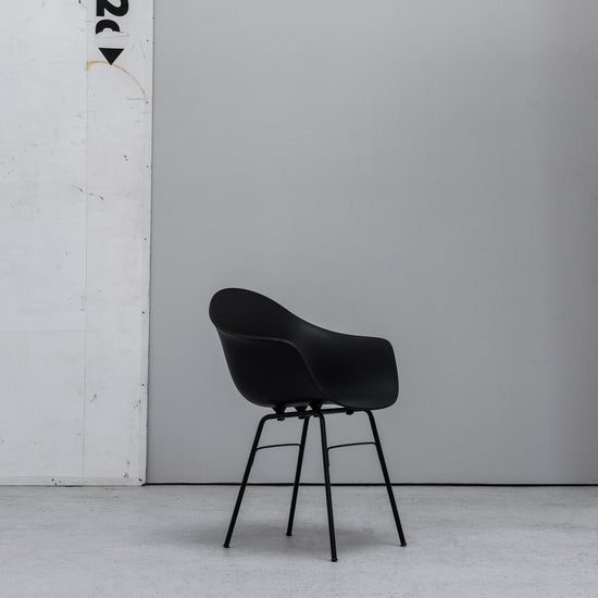 TOOU TA Bucket Armchair black with metal legs at EDITO Furniture