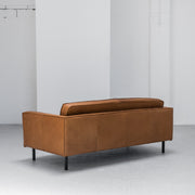 industrial tan leather sofa with black legs at EDITO Furniture