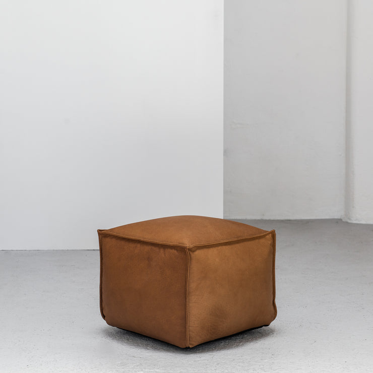 small tan leather Ottoman at EDITO Furniture