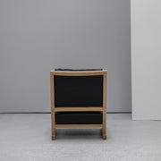 scandinavian Camerich Simon Armchair black leather and oak at EDITO Furniture