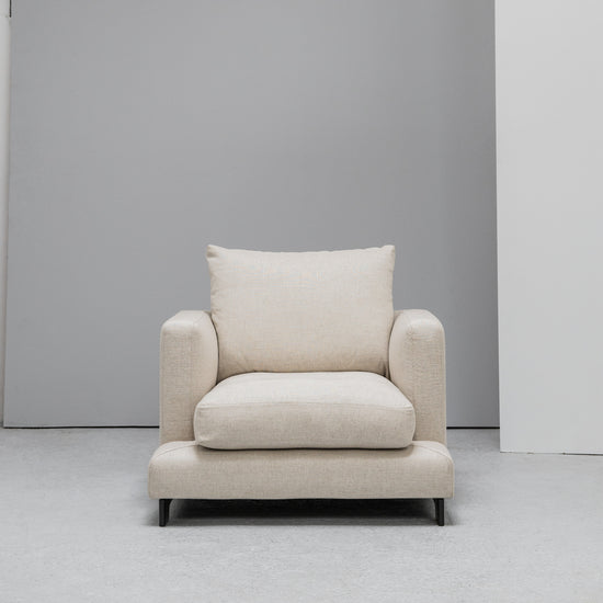 Cream linen Camerich Lazytime Armchair at EDITO Furniture