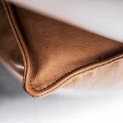 Tan leather stitching detail at EDITO Furniture